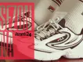 Białe buty sportowe Fila z czerwonym logo. Fila to znana marka odzieży i obuwia sportowego, idealna na nowy sezon.
