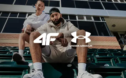 Para sportowców w strojach Under Armour, marki znanej z innowacyjnej odzieży sportowej.
