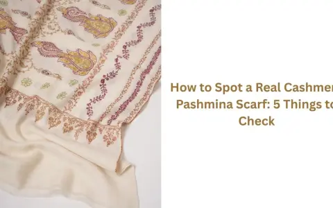 Pashmina co to? Kremowy szal z haftem paisley i kwiatów. Dowiedz się, jak rozpoznać prawdziwą pashminę.