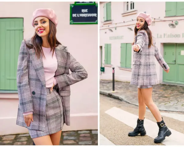Dziewczyna w różowym beretce i kraciastej marynarce z mini spódniczką, prezentująca styl preppy na tle paryskiej uliczki.