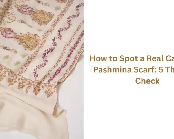 Pashmina co to? Kremowy szal z haftem paisley i kwiatów. Dowiedz się, jak rozpoznać prawdziwą pashminę.