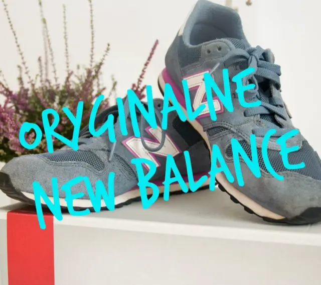 Szare buty New Balance, czy sizeer ma oryginalne buty? Na zdjęciu widać parę szarych sneakersów z fioletowymi i białymi akcentami.